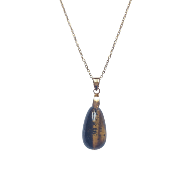 pendentif oeil de tigre taillé dans l'atelier fady cristaux